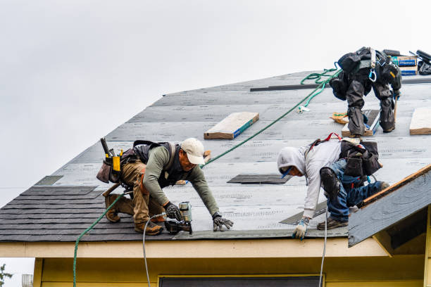 Professional Gutter Installation technician working in Litchfield, CT